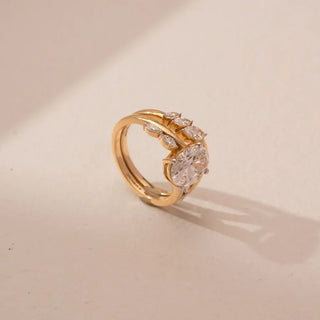 yellow gold stackable lab grown diamond engagement ring placed with a beige background