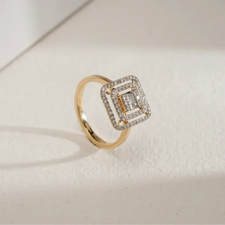 yellow gold men's regal lab grown diamond engagement ring placed with an off-white background