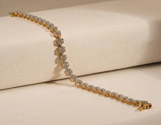 lab-grown diamond bracelet placed on a cream coloured cardboard with a cream coloured background