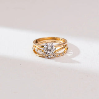 yellow gold lab grown diamond engagement ring placed with an off-white background