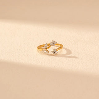 Close-up view of Floral Vine Diamond Ring in 14KT Yellow Gold, featuring diamond flowers and leaf motifs along the open, flowing band.
