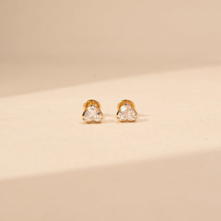 Front view of heart-shaped lab-grown diamond stud earrings in 14 KT Rose gold, featuring three-prong heart-cut solitaire diamonds in a timeless romantic design.
