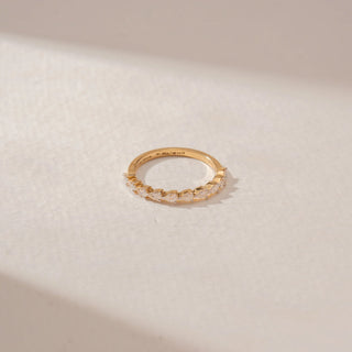 Top view of a 14KT Yellow Gold diamond band featuring alternating pear diamonds in a delicate half-eternity design.
