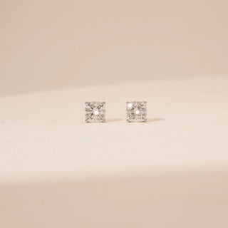Front view of square-cut diamond stud earrings in 14KT Yellow Gold, featuring four-prong settings.
