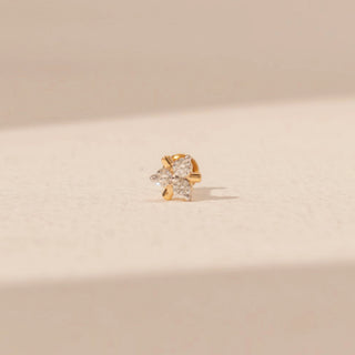 Front view of a 14KT yellow gold floral diamond nosepin, featuring clustered round and marquise-cut lab-grown diamonds.