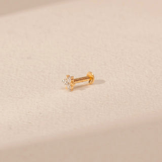 Side view of a 14KT yellow gold floral diamond nosepin, featuring clustered round and marquise-cut lab-grown diamonds.