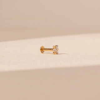 Angled view of a 14KT yellow gold floral diamond stud, featuring clustered round and marquise-cut lab-grown diamonds.