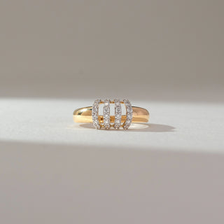 Front view of multi-row diamond band ring in yellow gold, featuring four vertical rows of round lab-grown diamonds across a polished band. Set on a soft neutral backdrop, it reflects bold structure and brilliance.
