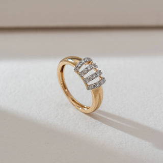 Side angled view of multi-row diamond band ring in yellow gold, featuring four vertical rows of round lab-grown diamonds across a polished band. Set on a soft neutral backdrop, it highlights bold structure and sparkle.