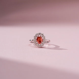 Front view of Majestic Crimson Halo Diamond Ring in 14KT White Gold, featuring an oval red lab-grown diamond with a diamond halo.