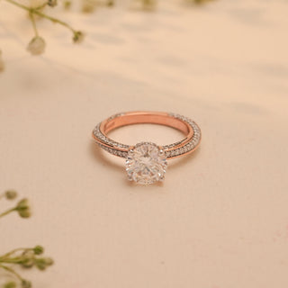 Top view of the Golden Promise Round Diamond Ring by Reia, showcasing a 1.7-carat round-cut lab-grown diamond with a pave-set rose gold band.
