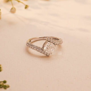 Top view of the Twinned Souls Diamond Vow Ring by Reia, featuring an oval-cut centre diamond embraced by pave-set white gold bands.