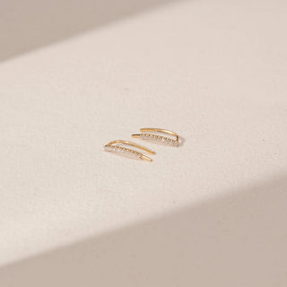 Side view of Curved Slider Diamond Earrings in 14KT Yellow Gold, featuring round lab-grown diamonds along the curved design.