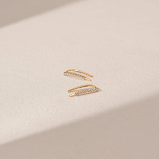 Top view of Curved Slider Diamond Earrings in 14KT Yellow Gold, featuring round lab-grown diamonds along the curved design.