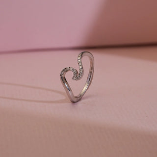 Front view of Curved Elegance Diamond Wave Ring in 14KT White Gold, featuring EF VVS round diamonds on a sculpted wave design that reflects fluidity, sparkle, and timeless elegance.