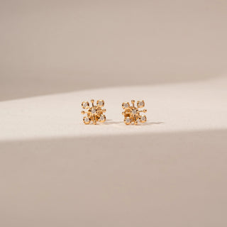 Front view of Sunburst Diamond Stud Earrings in 18KT Yellow Gold, featuring round lab-grown diamonds and gold rays.