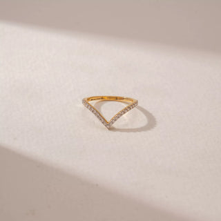 Front view of a 14KT Yellow Gold diamond ring featuring a V-shaped band set with small round diamonds.