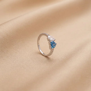 Radiant Blue Diamond Charm Ring