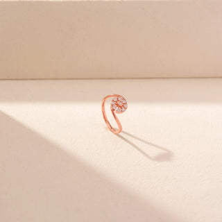 Angled view of Floral Cluster Diamond Open Ring in 14KT Rose Gold, featuring a diamond flower and curved open arms.