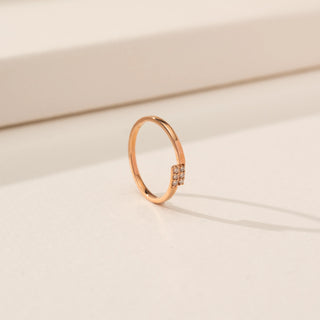 Angled view of Cluster Diamond Ring in 14KT Rose Gold, featuring round lab-grown diamonds in a rectangular cluster.