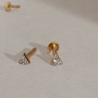 Angled view of Geometric Diamond Triangle Stud Earrings in 14KT Yellow Gold, showcasing EF VVS round-cut diamonds set in triangular frames with screw-back design.