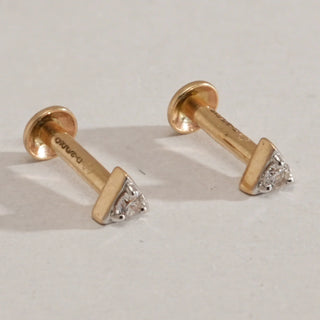 Close-up angled view of Geometric Diamond Triangle Stud Earrings in 14KT Yellow Gold, featuring EF VVS round-cut diamonds in triangular frames with secure screw-back design.