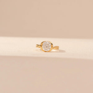 Elegant Round Bezel Diamond Ring