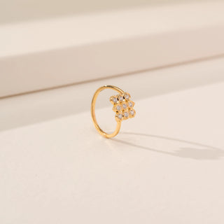 Angled view of Refined Orbit Sparkle Diamond Ring in 14KT Yellow Gold, featuring a cluster of round lab-grown diamonds.