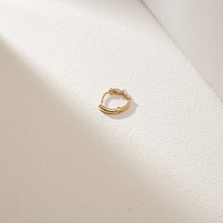 Top view of Petal Diamond Nose Pin in 14KT Yellow Gold, showcasing marquise-cut EF VVS diamonds totaling 0.07 carats in a delicate circular floral-inspired design.