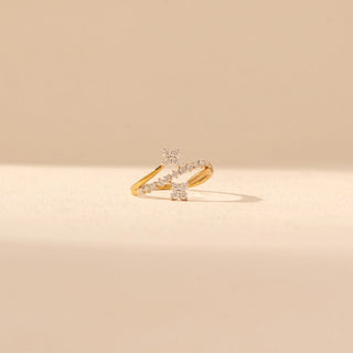 Close up  view of Interlocking Floral Diamond Ring in 14KT Yellow Gold, featuring crossing bands with round diamond clusters.