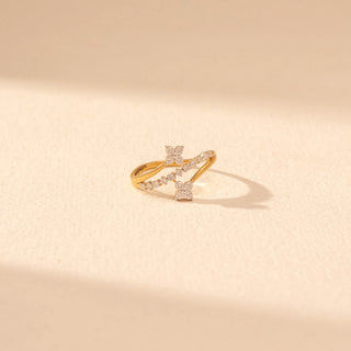 Front  view of Interlocking Floral Diamond Ring in 14KT Yellow Gold, featuring crossing bands with round diamond clusters.