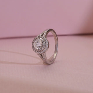 Angled view of Eternal Sparkle Diamond Halo Ring in 14KT White Gold, featuring 0.6 carat centre diamond, double pavé halos, and split shank for timeless elegance.