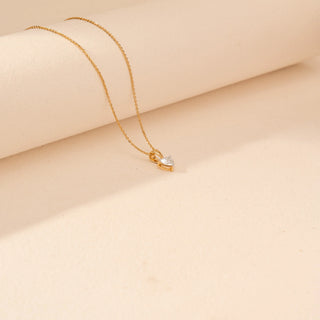Side view of Heart-Shaped Solitaire Diamond Pendant in 14KT Yellow Gold, featuring a heart-cut diamond on a delicate chain.