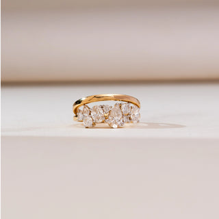 Front view of Asymmetric Multi-Shape Diamond Ring in 14KT yellow gold, featuring an oval centre diamond with mixed diamond shapes in a layered dual-band design.