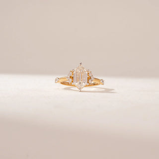 Front view of a 14KT Yellow Gold diamond ring featuring a duchess marquise diamond, marquise accents and delicate pavé detailing.
