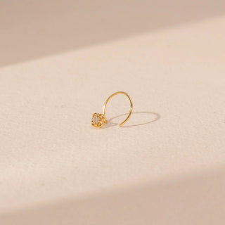 Angled view of Floral Diamond Nosepin in 14KT Yellow Gold, featuring a floral motif and centred diamond.