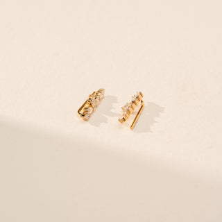 Angled view of Delicate Vine Cluster Diamond Earrings in 14KT Yellow Gold, featuring marquise lab-grown diamonds.