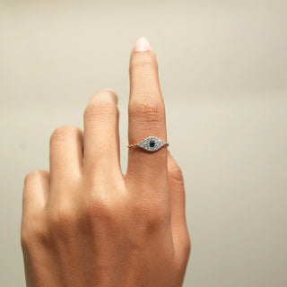 Front view of Azure Eye Diamond Ring in 14KT Yellow Gold, featuring a blue centre diamond surrounded by round lab-grown diamonds.