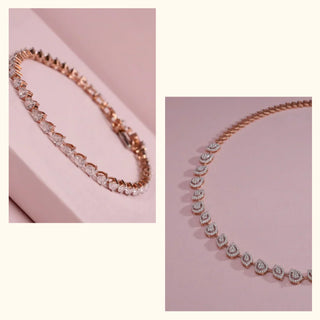 Statement lab-grown diamond necklace by Réia featuring repeating pear-shaped motifs, displayed as angled close-ups on soft blush surfaces, highlighting pavé detailing and polished gold links under gentle studio lighting.