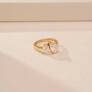 Top view of Dazzling Pear Bypass Diamond Ring in 14KT Yellow Gold, featuring two pear-cut lab-grown diamonds.