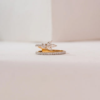Front view of the Marquise Leaf Cluster Diamond Ring in 14KT yellow gold, showcasing marquise-cut diamonds arranged in a leaf cluster with a round center stone and a pavé diamond band on a neutral background.