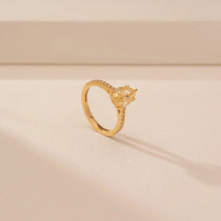 Angled view of Ethereal Pear Solitaire Diamond Ring in 14KT Yellow Gold, featuring a pear-cut lab-grown diamond.