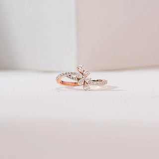 Front view of Rose Gold Blossom Diamond Ring in 14KT rose gold, featuring a five pear-shaped diamond flower with a sparkling pavé-set bypass band.