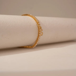 Side view of Delicate Diamond Initial Charm Bracelet in 14KT Dual Gold, featuring round lab-grown diamonds and initial charm.