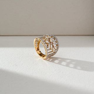 Angled view of Wide Floral Diamond Ring in 14KT Yellow Gold, featuring marquise lab grown diamonds in a lattice cluster with pavé border. Set on a neutral backdrop, the design highlights intricate brilliance.
