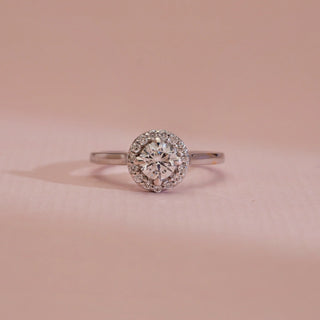 Close-up of 14KT White Gold Classic Diamond Halo Engagement Ring with round EF VVS centre diamond and pavé halo setting, crafted for timeless sparkle and elegant brilliance.