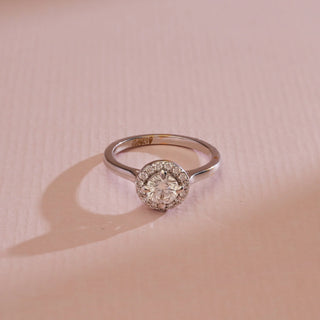 Top view of 14KT White Gold Classic Diamond Halo Engagement Ring with round EF VVS solitaire and pavé halo diamonds, crafted for timeless sparkle and meaningful elegance.