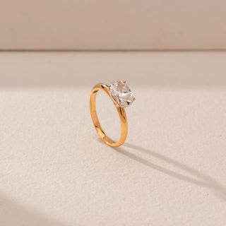 Angled view of Oval Diamond Solitaire Ring in 14KT Yellow Gold, featuring a prominent oval lab-grown diamond on a sleek band.