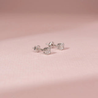 Close-up view of Elegant Cushion Cut Diamond Earrings in 14KT White Gold, featuring cushion-cut lab-grown diamonds.