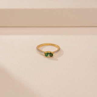 Top view of Elegant Emerald Duo Diamond Ring in 14KT Yellow Gold, featuring green emeralds and round lab-grown diamonds.